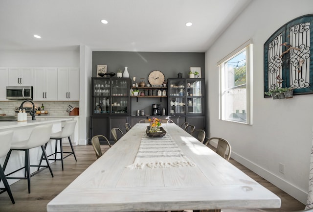 dining area featuring hardwood / wood-style flooring