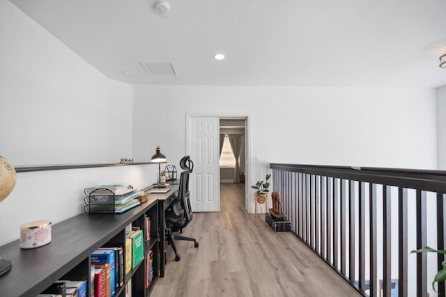 home office featuring light hardwood / wood-style floors