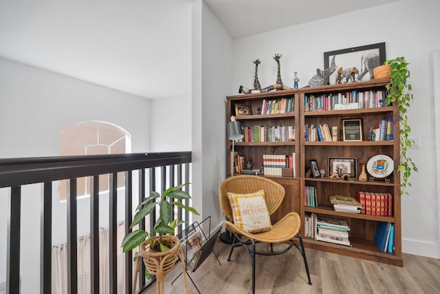 sitting room featuring light hardwood / wood-style flooring