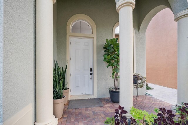 property entrance with a garage