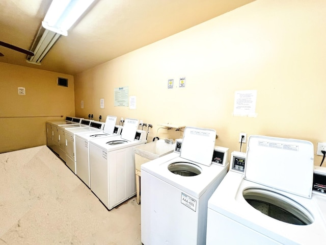 laundry room featuring independent washer and dryer