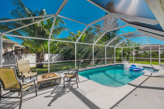 view of pool featuring a lanai and a patio area