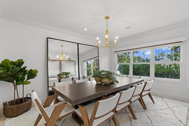 dining room featuring a notable chandelier and ornamental molding