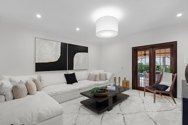 living room featuring ornamental molding and french doors