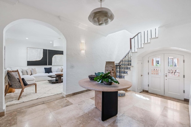 foyer entrance with crown molding