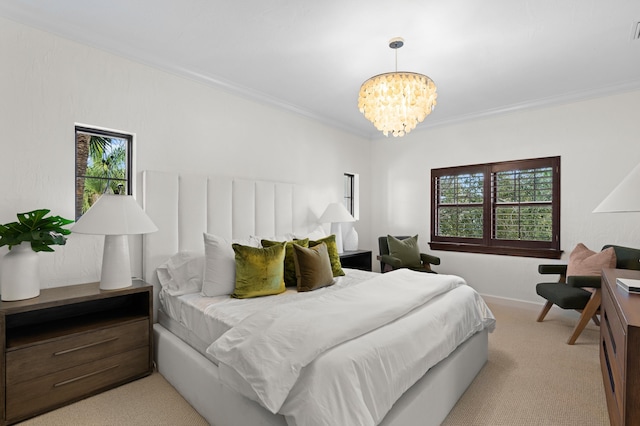 bedroom featuring light colored carpet, a notable chandelier, and ornamental molding