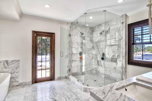 bathroom with vanity, crown molding, and independent shower and bath