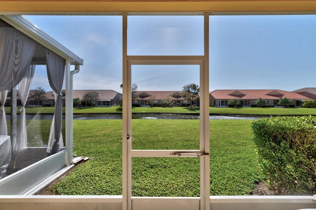 exterior space with a water view