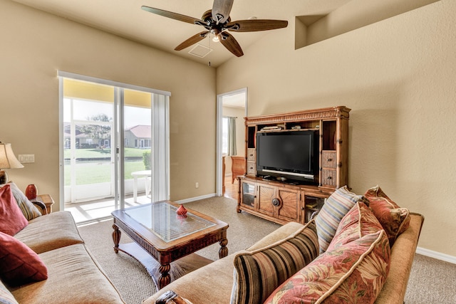 living room with light carpet, ceiling fan, and lofted ceiling