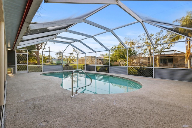 view of pool featuring a patio area and a lanai