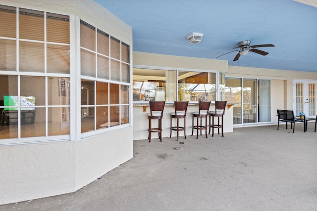 view of patio / terrace featuring ceiling fan