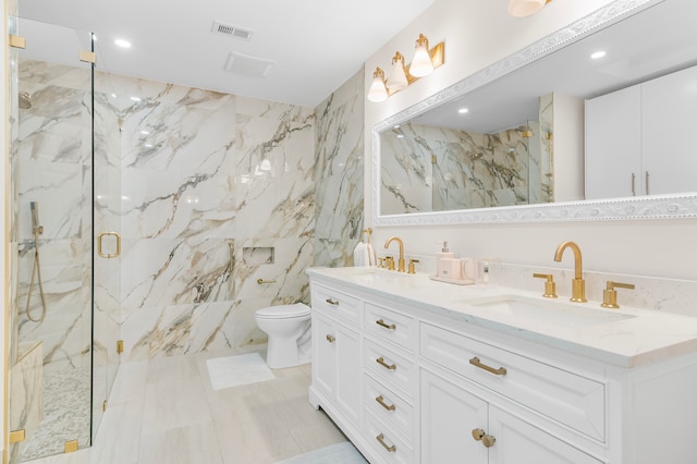 bathroom with toilet, vanity, tile walls, and walk in shower