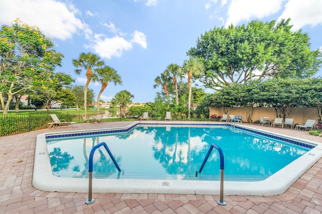 view of pool featuring a patio