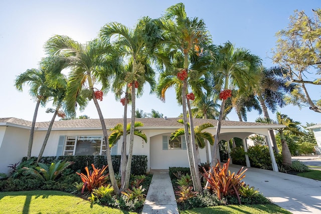 view of front of property with a carport