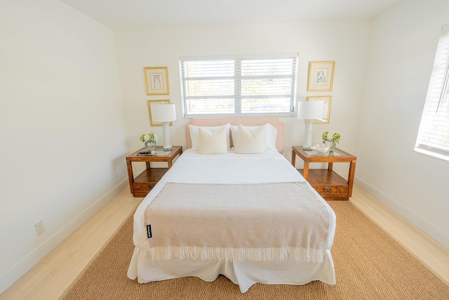 bedroom featuring light wood-type flooring