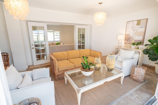 living room featuring a notable chandelier