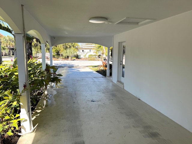 view of patio / terrace with a carport