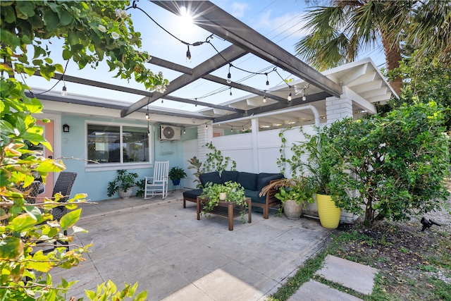 view of patio / terrace featuring an outdoor living space and a pergola