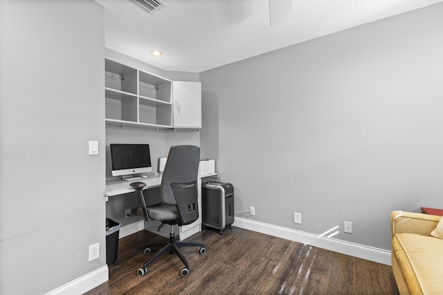 office featuring a textured ceiling and dark hardwood / wood-style floors