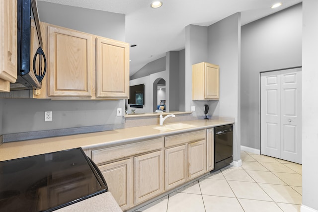 kitchen featuring black appliances, light tile patterned flooring, sink, and light brown cabinets