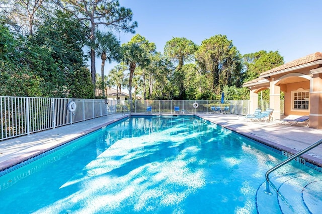 view of pool with a patio