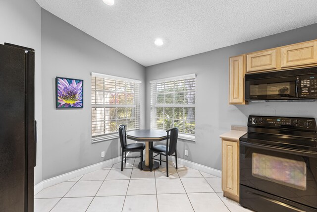 dining area with light tile patterned floors