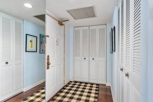 interior space with dark wood-type flooring