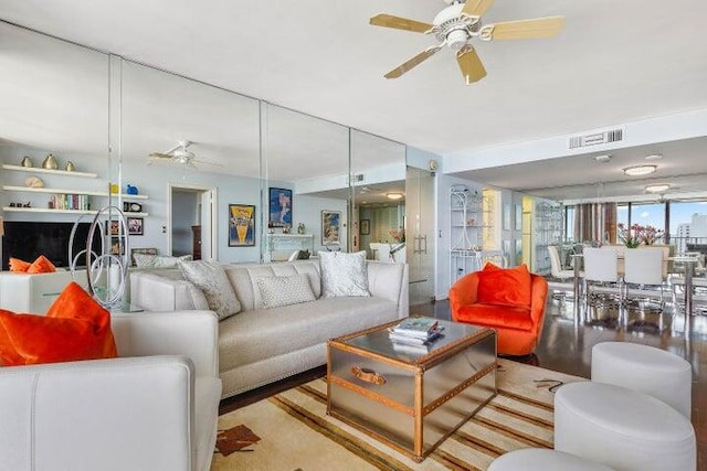 living room featuring ceiling fan