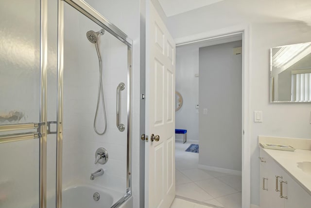 bathroom with shower / bath combination with glass door, vanity, and tile patterned floors