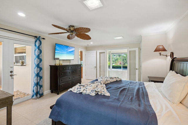 bedroom featuring ceiling fan, crown molding, and french doors