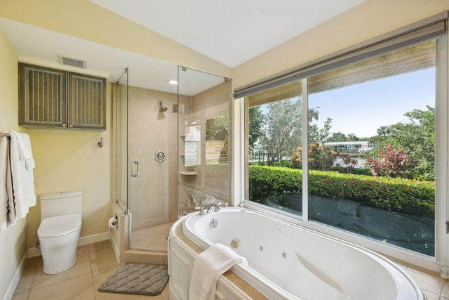 bathroom with tile patterned floors, toilet, lofted ceiling, and independent shower and bath