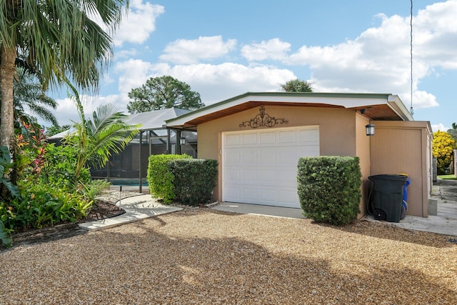 view of side of home featuring a lanai