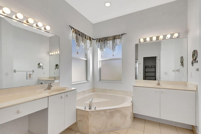 bathroom with vanity, tile patterned flooring, and separate shower and tub