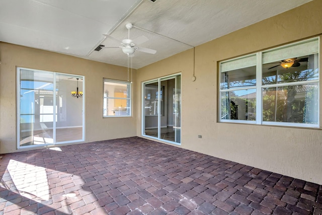 view of patio / terrace featuring ceiling fan