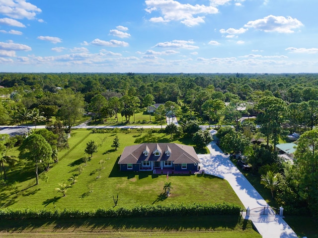 birds eye view of property featuring a rural view