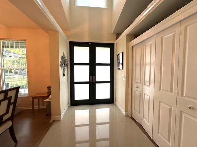 doorway to outside with french doors and light hardwood / wood-style flooring