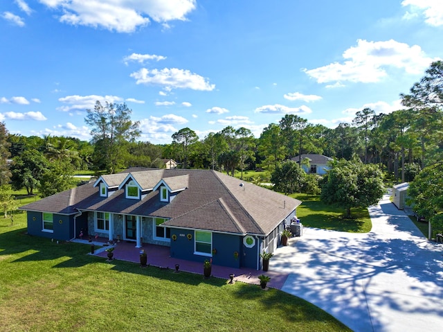 view of front of property with a front lawn