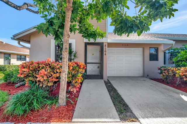 view of front of home featuring a garage