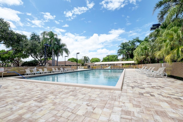 view of swimming pool featuring a patio