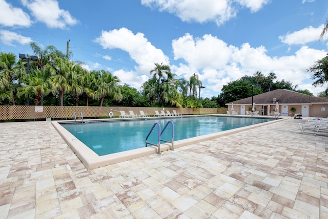 view of swimming pool featuring a patio