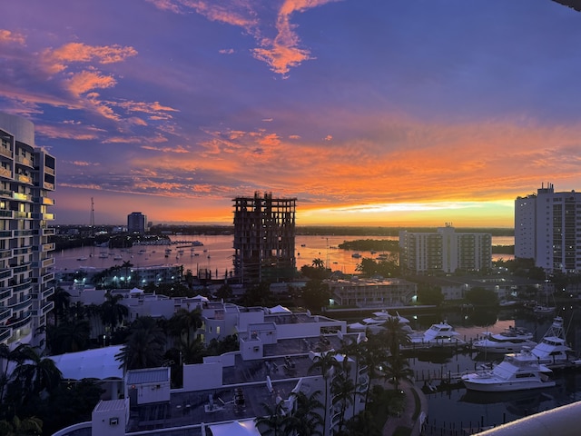 property's view of city featuring a water view