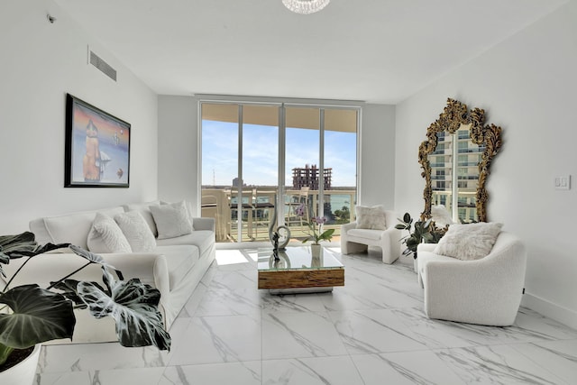 living room with a wall of windows