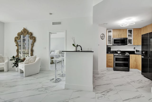 kitchen featuring sink and appliances with stainless steel finishes