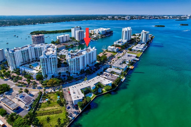 birds eye view of property featuring a water view