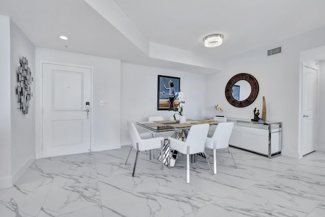 dining area featuring visible vents, recessed lighting, marble finish floor, and baseboards