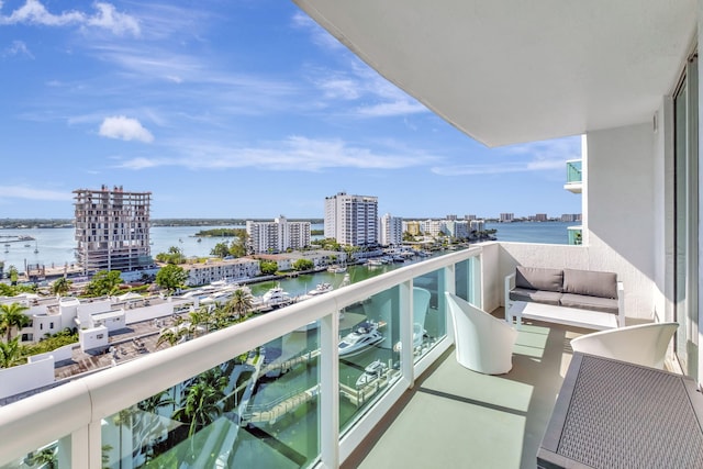 balcony featuring a water view