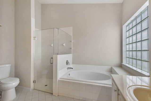 full bathroom with tile patterned flooring, vanity, toilet, and independent shower and bath