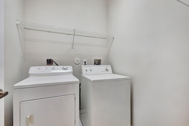 laundry area with washer and clothes dryer