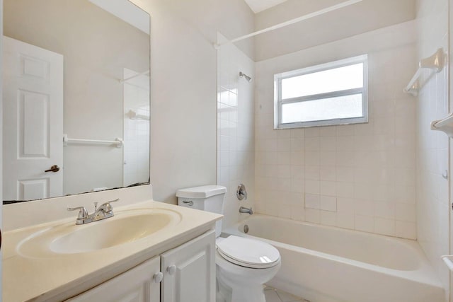 full bathroom with tile patterned floors, tiled shower / bath combo, toilet, and vanity