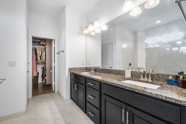 bathroom featuring a shower, wood-type flooring, and vanity